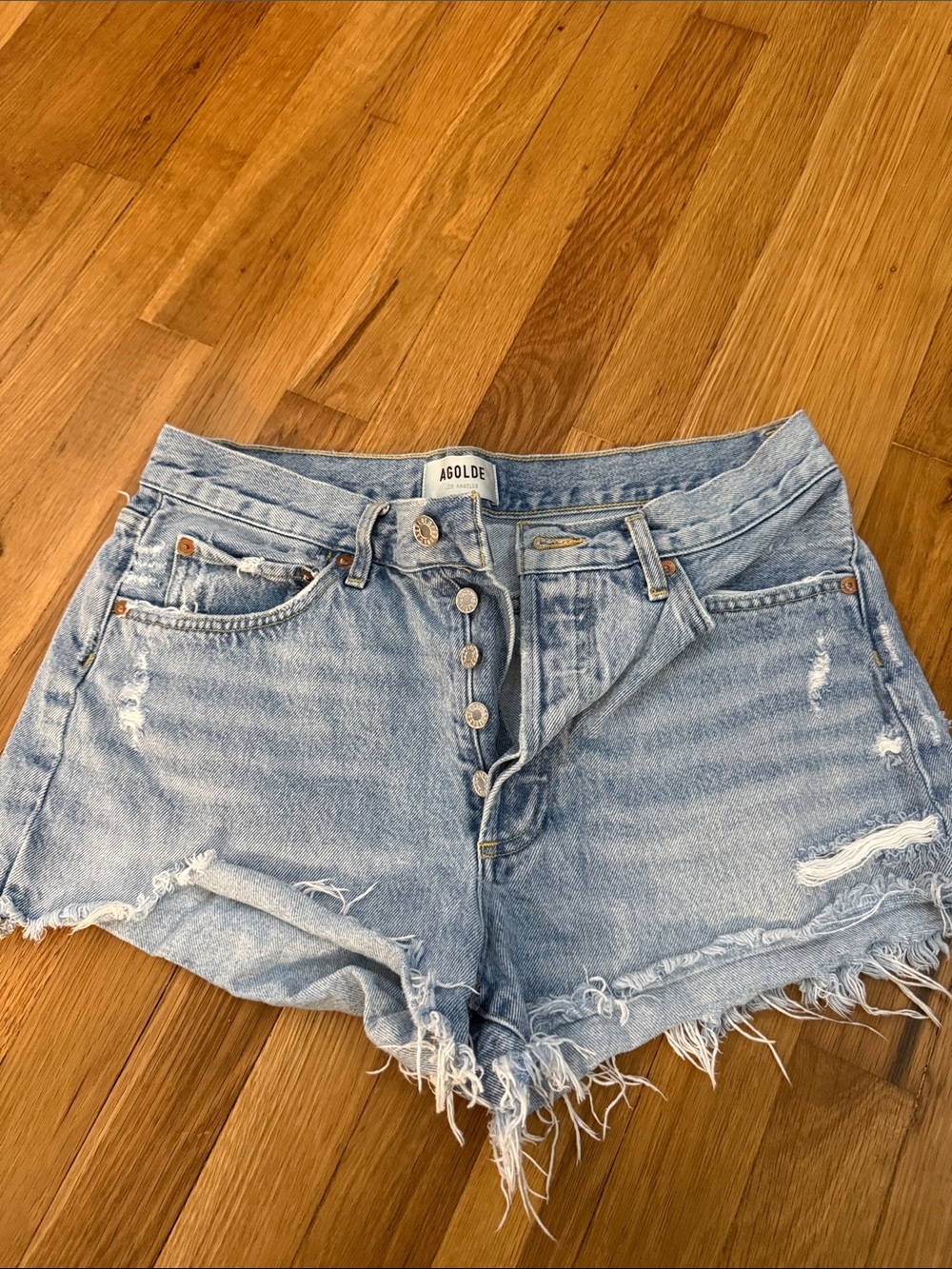 Agolde Light Wash Distressed Denim Cutoff Shorts